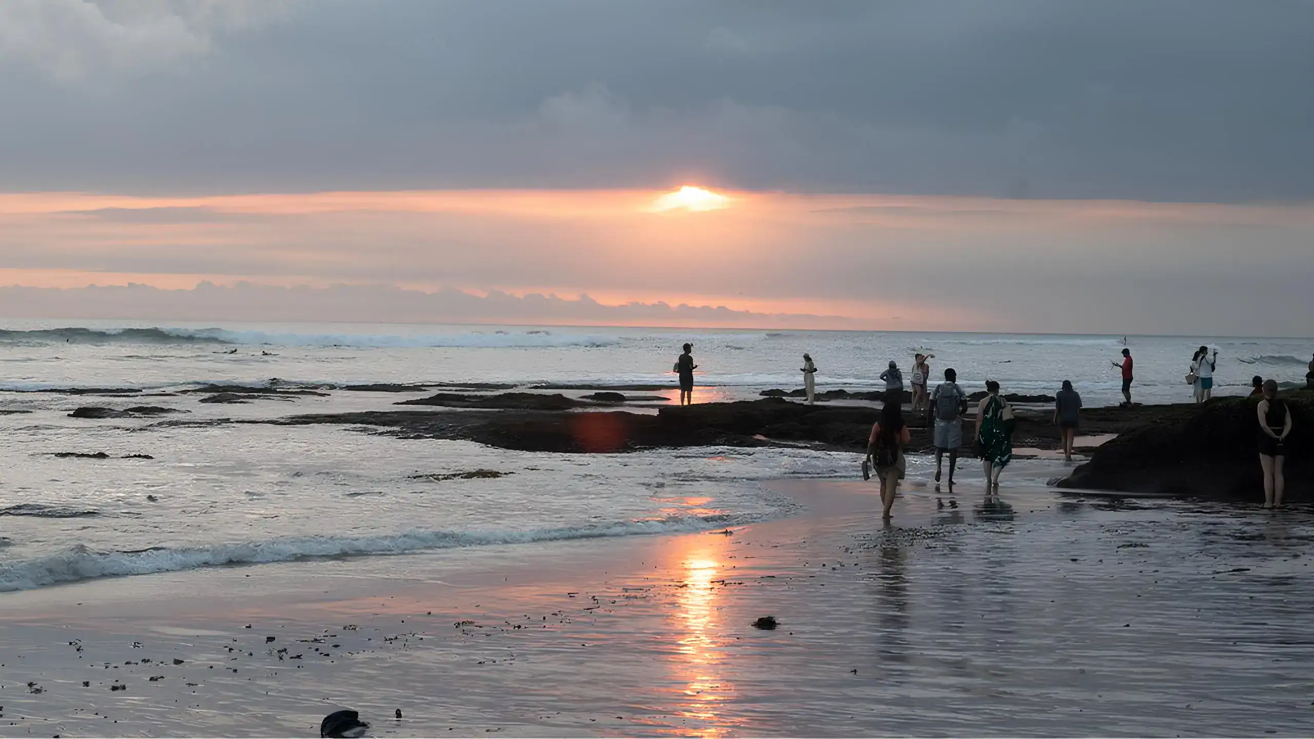 People watching sunset at Batu Bolong Beach in Canggu, classic Canggu evening experience