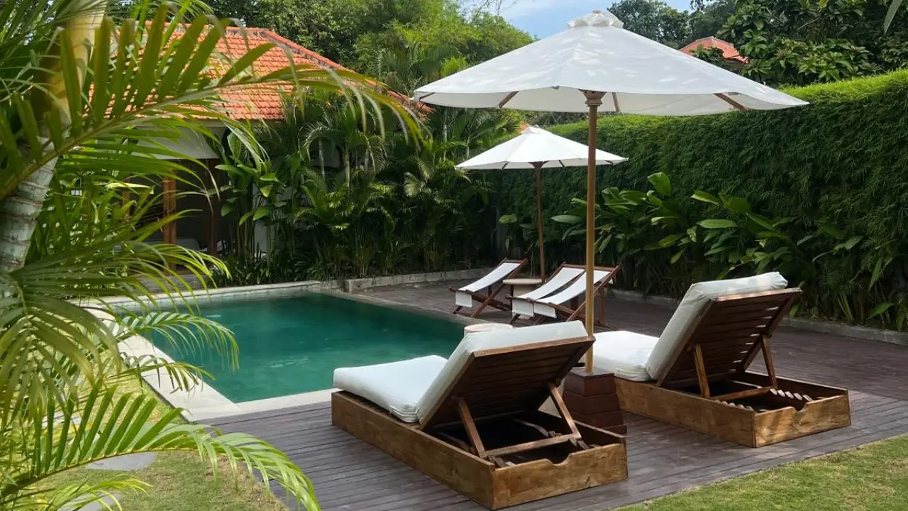 Slow morning at a private villa in Canggu with poolside sun loungers, relaxing way to spend one day in Canggu